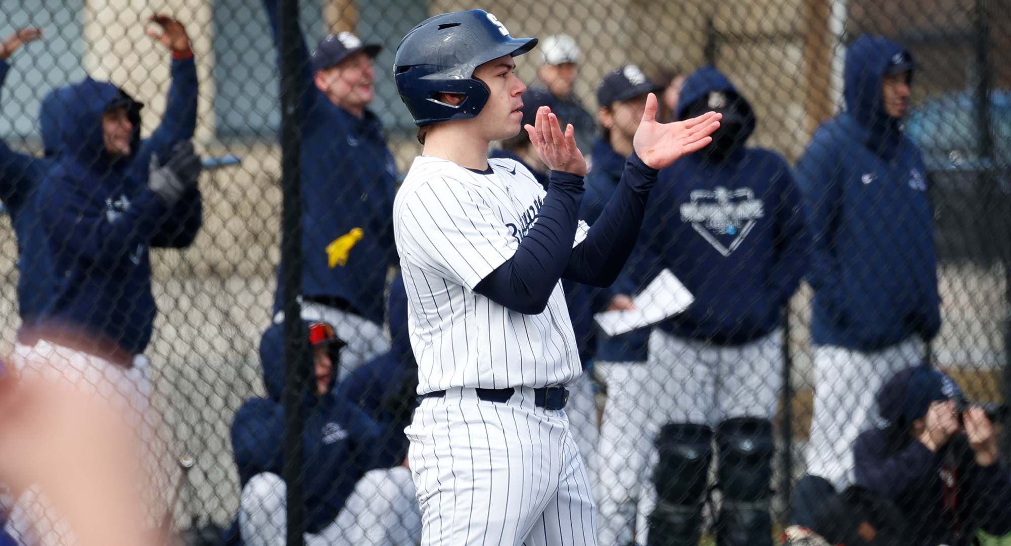 baseball player clapping
