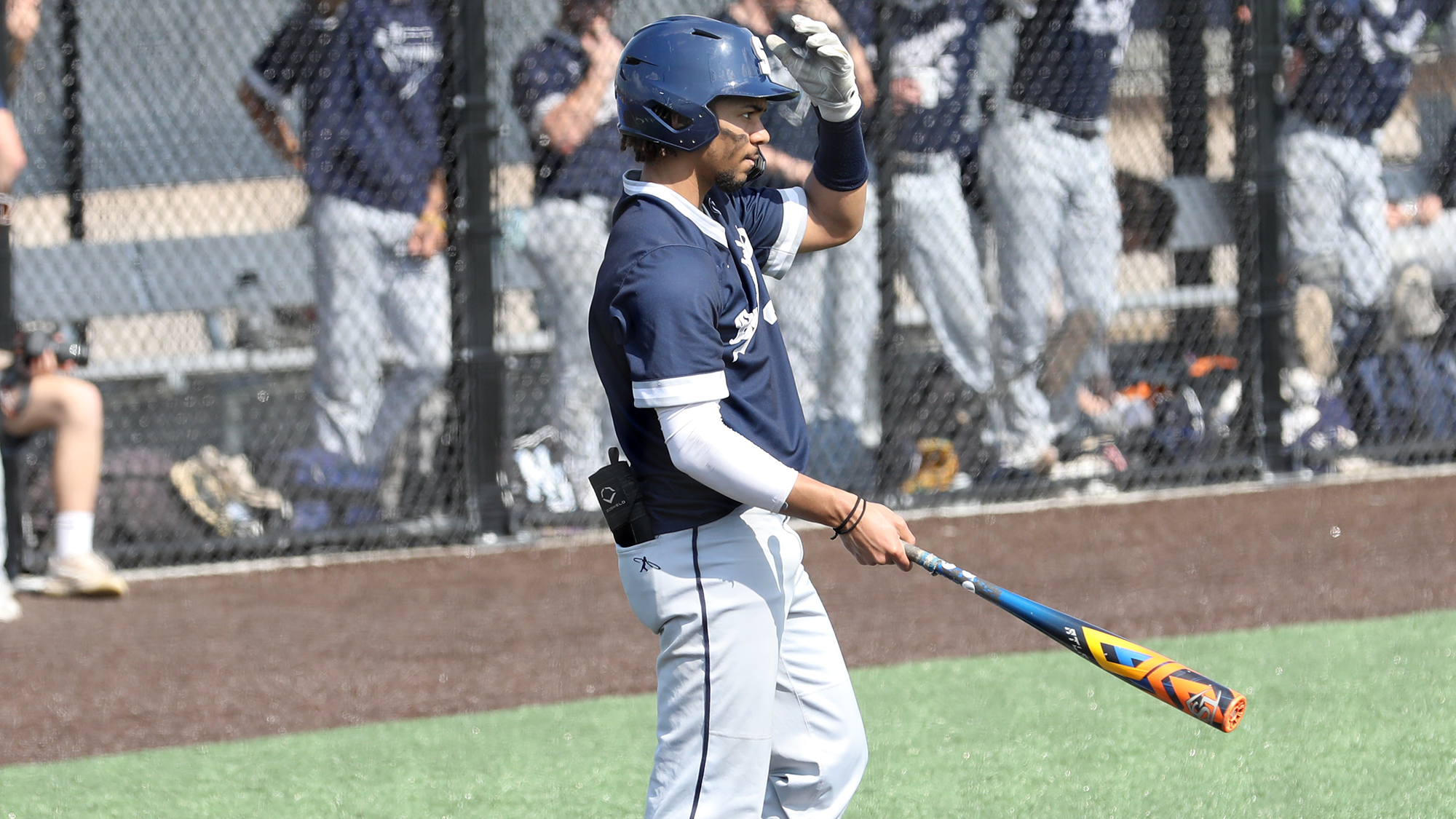 baseball player steps to the plate