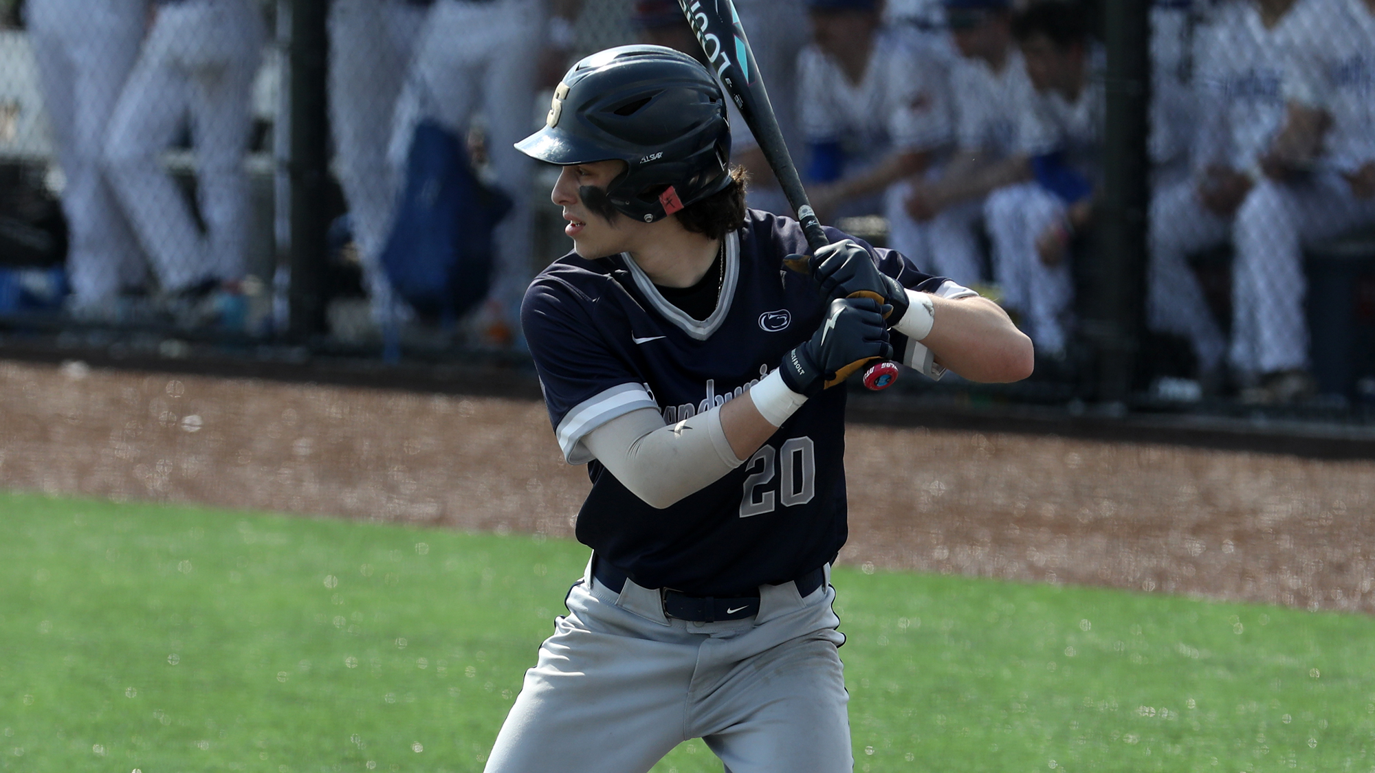 baseball player with bat in hand