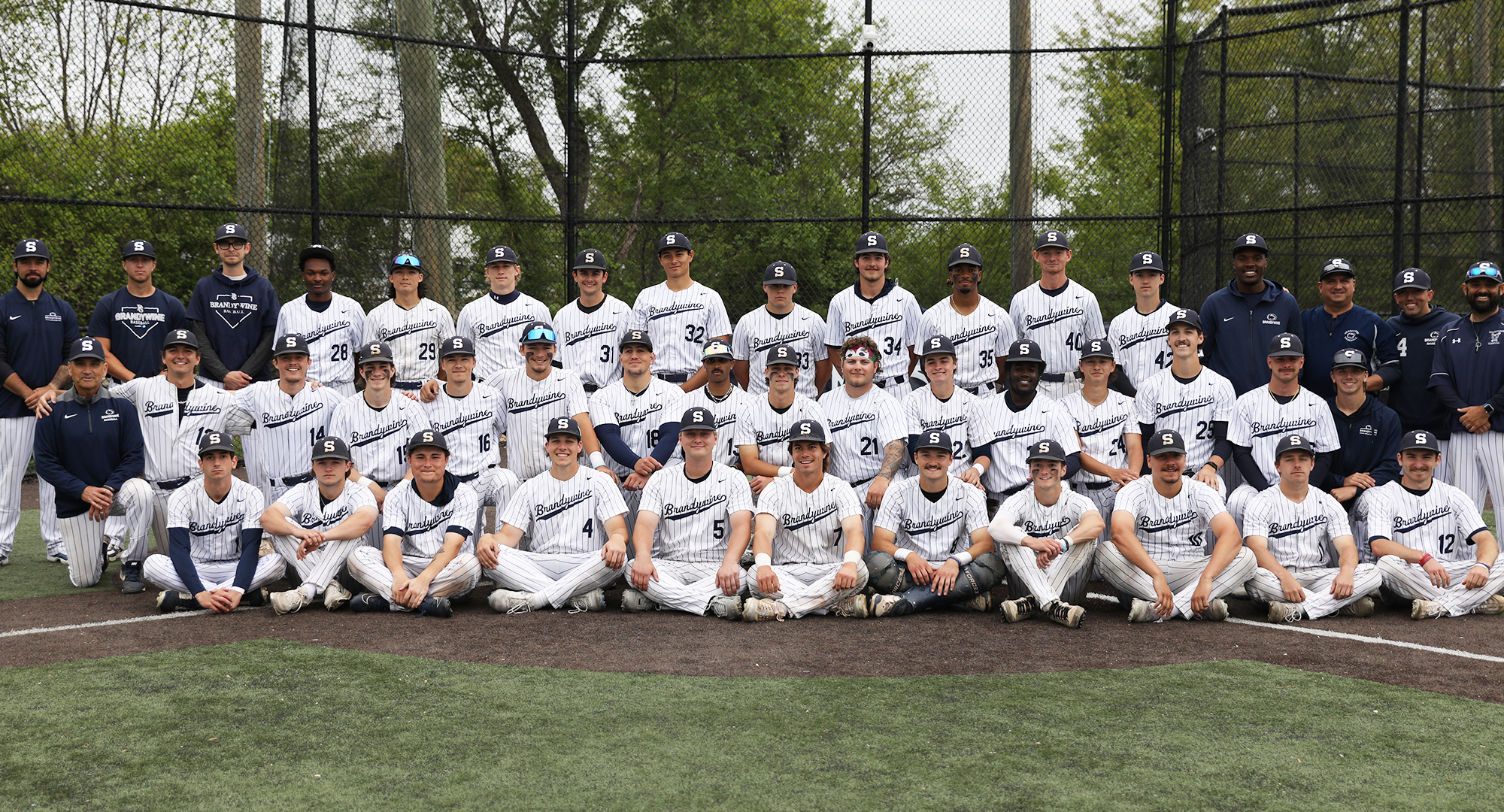 baseball team poses for group picture